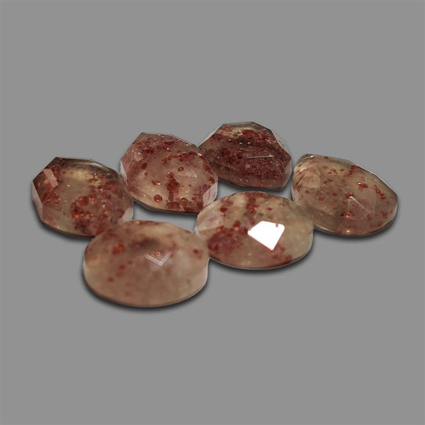 Portrait Cut Garnet In Quartz Lot