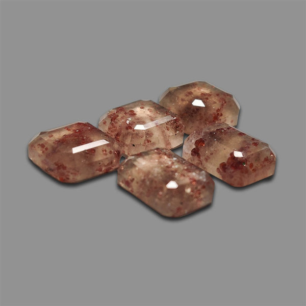 Portrait Cut Garnet In Quartz Lot